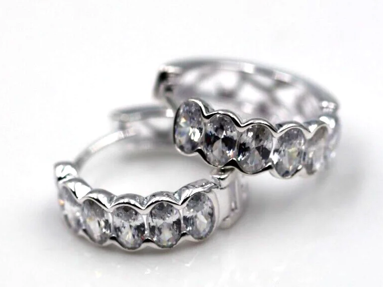 Sterling silver hoop earringsGenuine New Sterling Silver 925 Fancy Oval CZ Huggies Earrings Sterling silver hoop earringsGenuine New Sterling Silver 925 Fancy Oval CZ Huggies Earrings