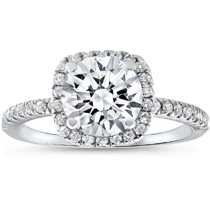 Cathedral - Style Women's Diamond Rings with a Raised Center Setting and Elaborate MetalworkPlatinum 1 ct Diamond Engagement Ring Cushion Halo Ring Cathedral - Style Women's Diamond Rings with a Raised Center Setting and Elaborate MetalworkPlatinum 1 ct Diamond Engagement Ring Cushion Halo Ring