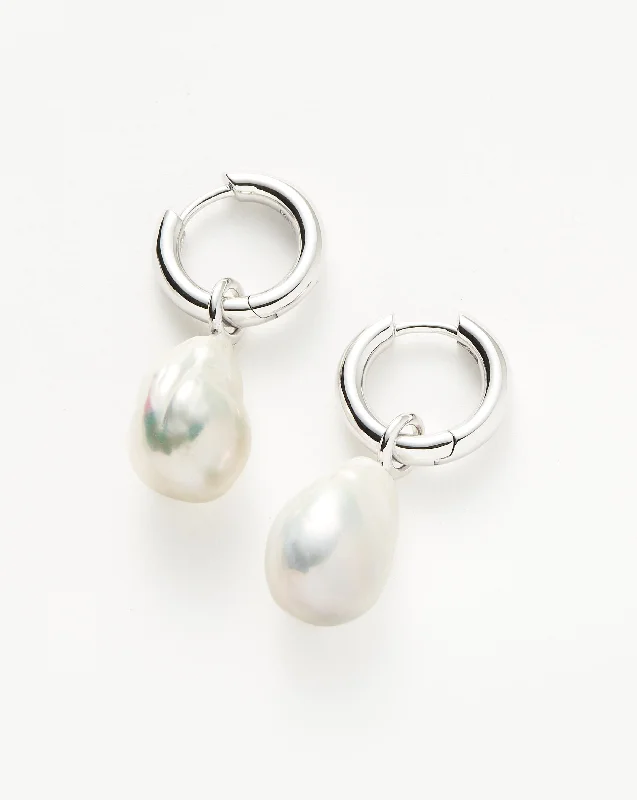 Trendy hoop earringsBaroque Pearl Drop Tunnel Mini Hoop Earrings | Sterling Silver Trendy hoop earringsBaroque Pearl Drop Tunnel Mini Hoop Earrings | Sterling Silver