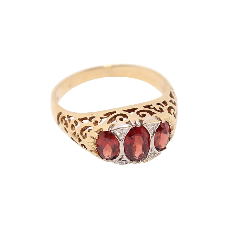 Gothic - Style Women's Rings with Black Onyx and Silver SkullsYellow Gold Three Stone Garnet and Diamond Dress Ring Gothic - Style Women's Rings with Black Onyx and Silver SkullsYellow Gold Three Stone Garnet and Diamond Dress Ring
