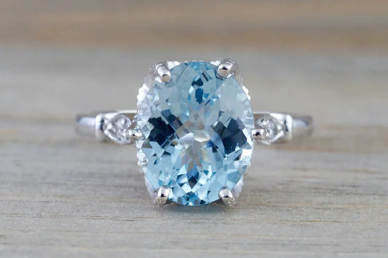 Men's sapphire - set rings for a royal blue hue14k White Gold 11x9mm Oval Aquamarine And Diamonds Men's sapphire - set rings for a royal blue hue14k White Gold 11x9mm Oval Aquamarine And Diamonds