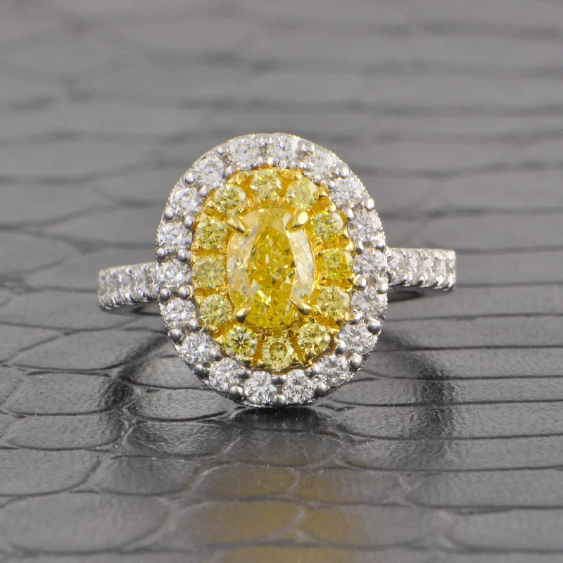 Amethyst and diamond engagement ring in a 18K gold and silver two - tone settingFancy Yellow Oval Cut Diamond Halo Ring in 18k Gold Amethyst and diamond engagement ring in a 18K gold and silver two - tone settingFancy Yellow Oval Cut Diamond Halo Ring in 18k Gold