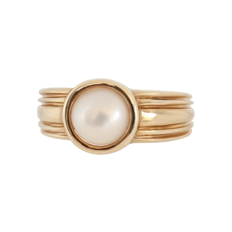 Interlocking Band Women's Rings in White Gold for a Modern DesignYellow Gold Round Mabe Pearl Ring with Grooves Interlocking Band Women's Rings in White Gold for a Modern DesignYellow Gold Round Mabe Pearl Ring with Grooves