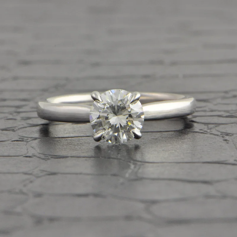Oval - cut sapphire and diamond engagement ring in 18K white goldGIA 1.06 ct. I-SI2 Round Brilliant Cut Diamond Engagement Ring in White Gold Oval - cut sapphire and diamond engagement ring in 18K white goldGIA 1.06 ct. I-SI2 Round Brilliant Cut Diamond Engagement Ring in White Gold