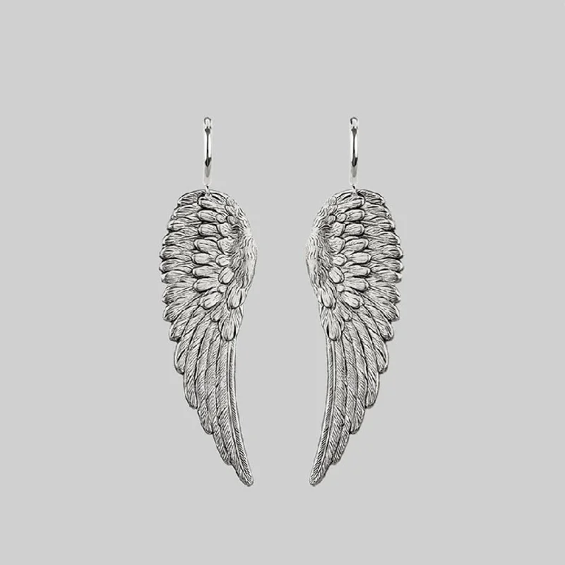 Rose gold hoop earringsFALLEN SAINT. Angel Wing Hoop Earrings - Silver
