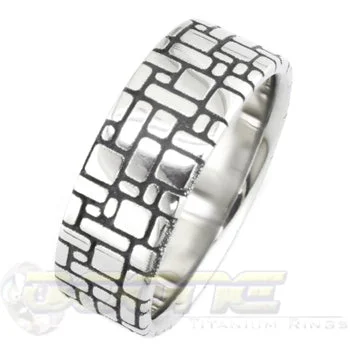 Titanium Rings with a Cubic Zirconia - Embellished BandStone Wall