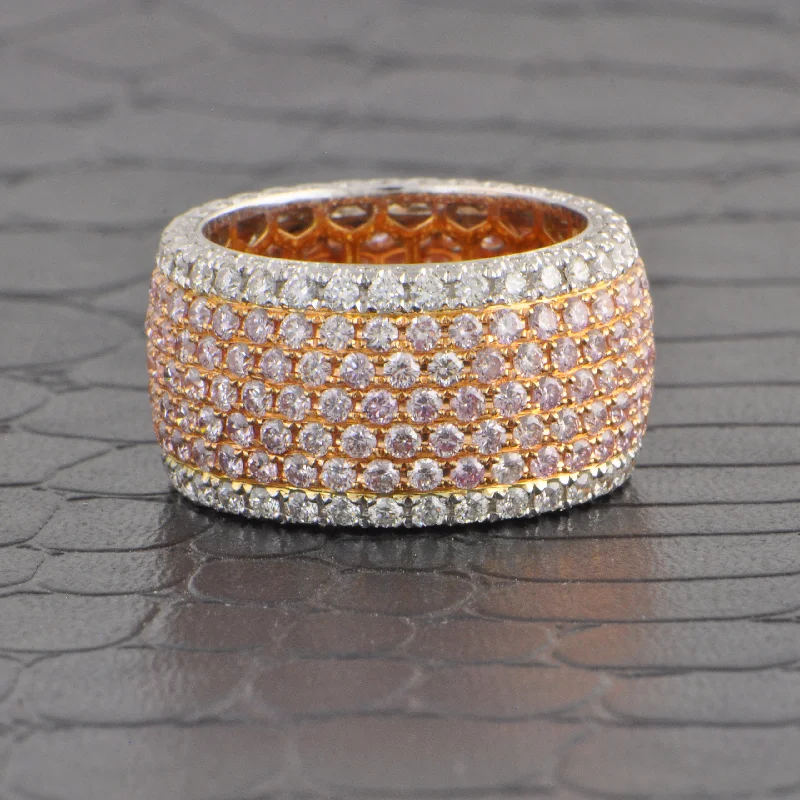 Radiant - cut diamond engagement ring with a bezel - set center stone in 18K yellow goldStatement Pink and White Diamond Band in 18k Gold Radiant - cut diamond engagement ring with a bezel - set center stone in 18K yellow goldStatement Pink and White Diamond Band in 18k Gold
