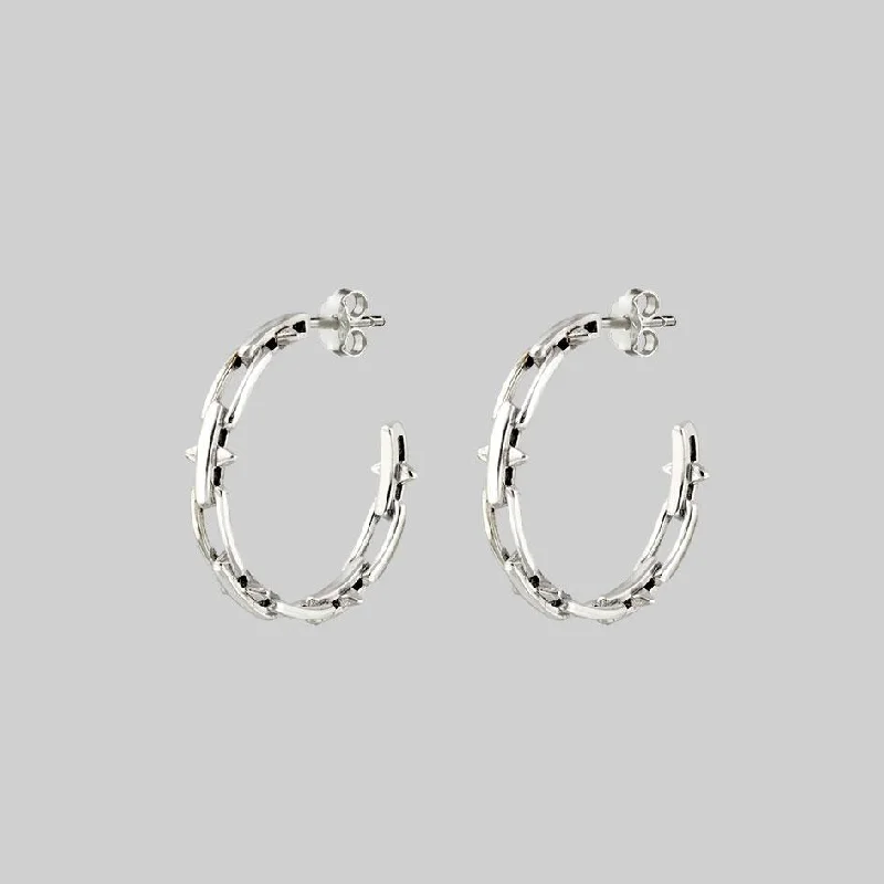 Huggie hoop earringsLUCIA. Spiked Chain Hoop Earrings - Silver