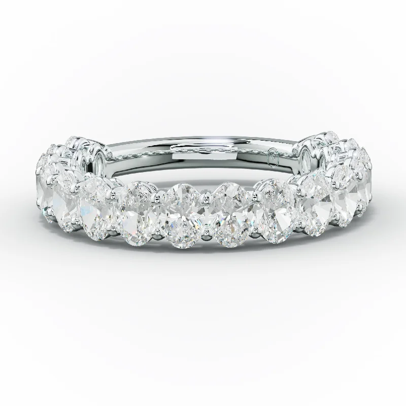 10K gold anniversary rings with a floral engraved band2.0 Carat Oval Diamond Anniversary Band 10K gold anniversary rings with a floral engraved band2.0 Carat Oval Diamond Anniversary Band