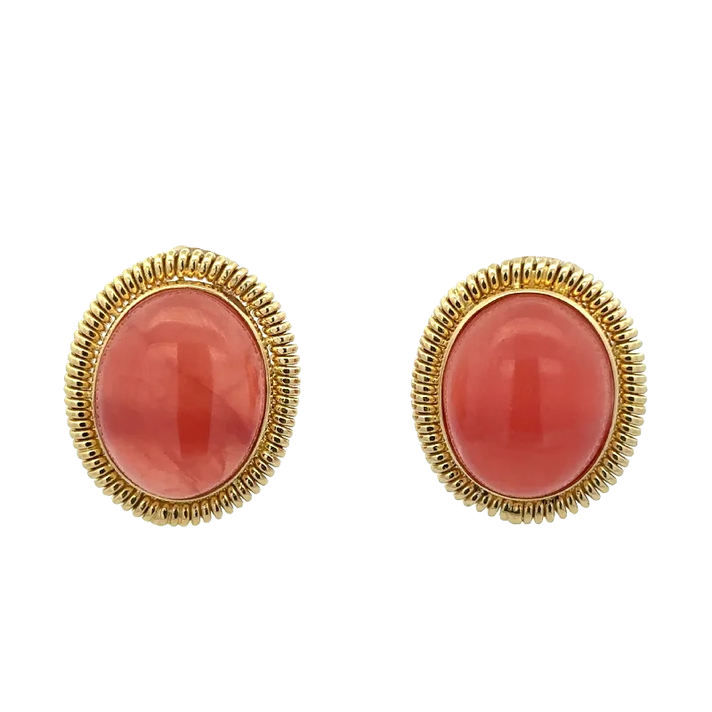 Ruby and diamond engagement ring with a halo of diamonds in 14K red goldStatement Vintage Rhodocrosite Clip-on Earrings in 18k Yellow Gold Ruby and diamond engagement ring with a halo of diamonds in 14K red goldStatement Vintage Rhodocrosite Clip-on Earrings in 18k Yellow Gold