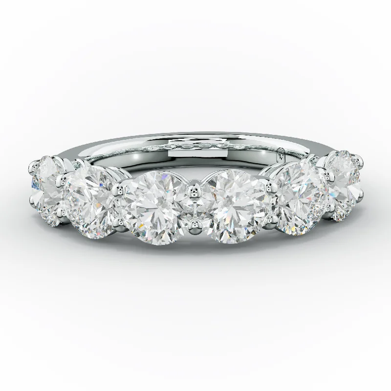 Anniversary rings with a halo setting around the center stone3.0 Carat Round Diamond Anniversary Ring