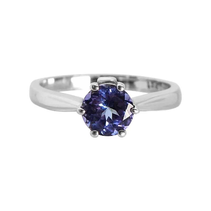 Women's Rings with Birthstones for a Personalized TouchSix Claw Round Tanzanite and Diamond with Doughnuts on the side Women's Rings with Birthstones for a Personalized TouchSix Claw Round Tanzanite and Diamond with Doughnuts on the side