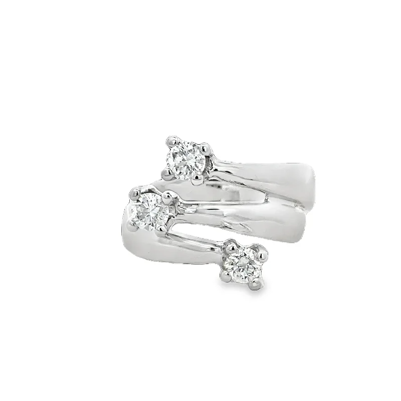 Pink diamond engagement ring in a rose - gold band with white - gold accentsVintage Diamond Bypass Ring in White Gold Pink diamond engagement ring in a rose - gold band with white - gold accentsVintage Diamond Bypass Ring in White Gold