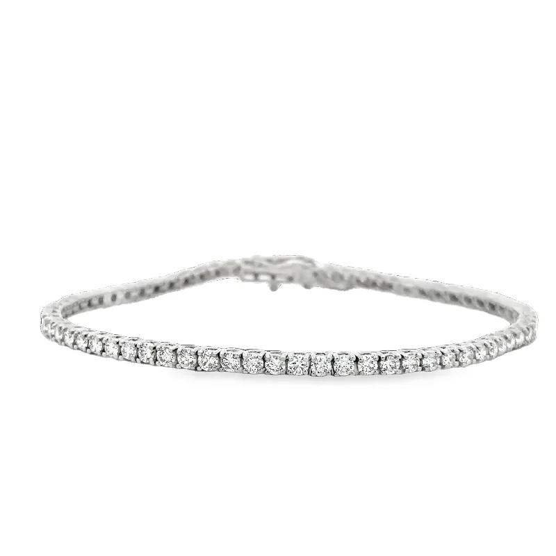 Pink diamond engagement ring in a rose - gold band with white - gold accents3.0 CTW Diamond Tennis Bracelet in White Gold Pink diamond engagement ring in a rose - gold band with white - gold accents3.0 CTW Diamond Tennis Bracelet in White Gold