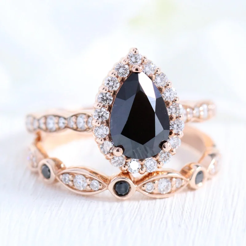 Cushion - Cut Women's Diamond Rings in Platinum with a Soft and Romantic AppearanceLuna Halo Black Diamond Pear Ring Set w/ Black and White Diamond Wedding Band Cushion - Cut Women's Diamond Rings in Platinum with a Soft and Romantic AppearanceLuna Halo Black Diamond Pear Ring Set w/ Black and White Diamond Wedding Band