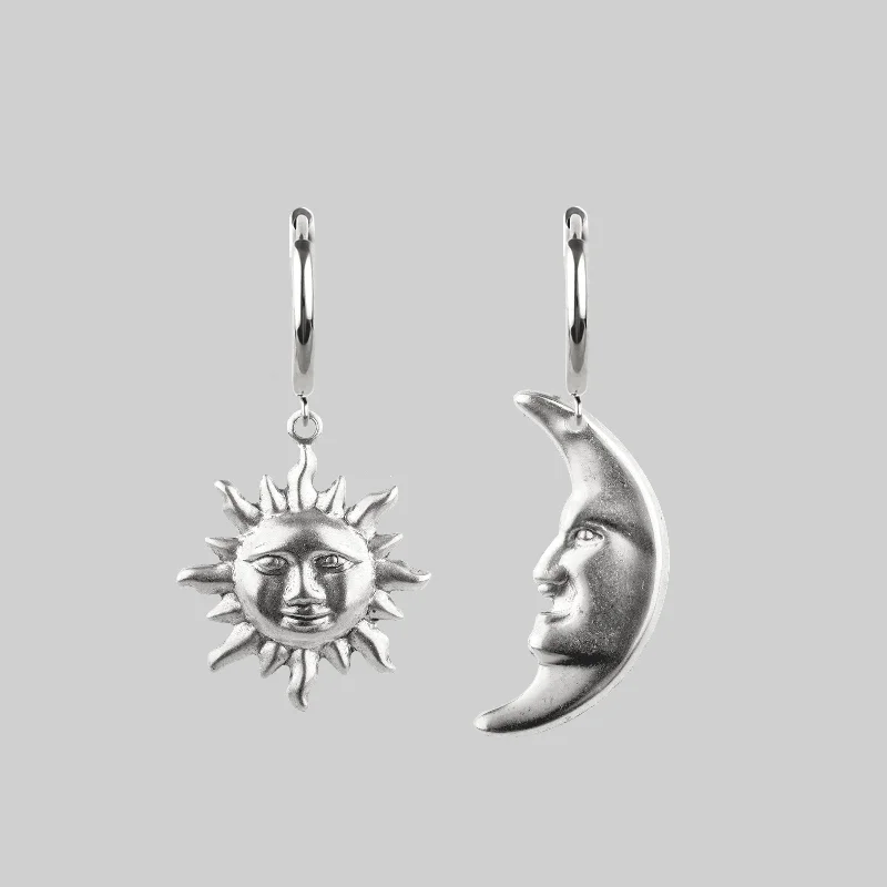 Rose gold hoop earringsDAY TO NIGHT. Sun & Moon Hoop Earrings - Silver