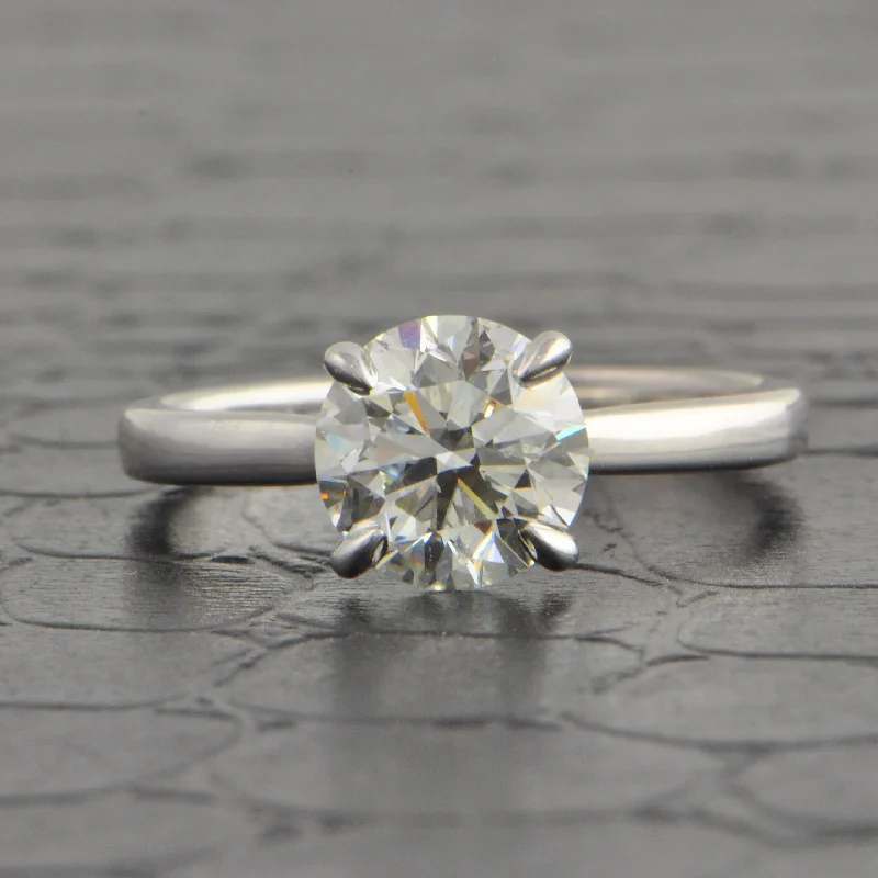 Radiant - cut diamond engagement ring with a bezel - set center stone in 18K yellow goldGIA 1.79 ct. Round Brilliant Cut Diamond Engagement Ring in White Gold Radiant - cut diamond engagement ring with a bezel - set center stone in 18K yellow goldGIA 1.79 ct. Round Brilliant Cut Diamond Engagement Ring in White Gold