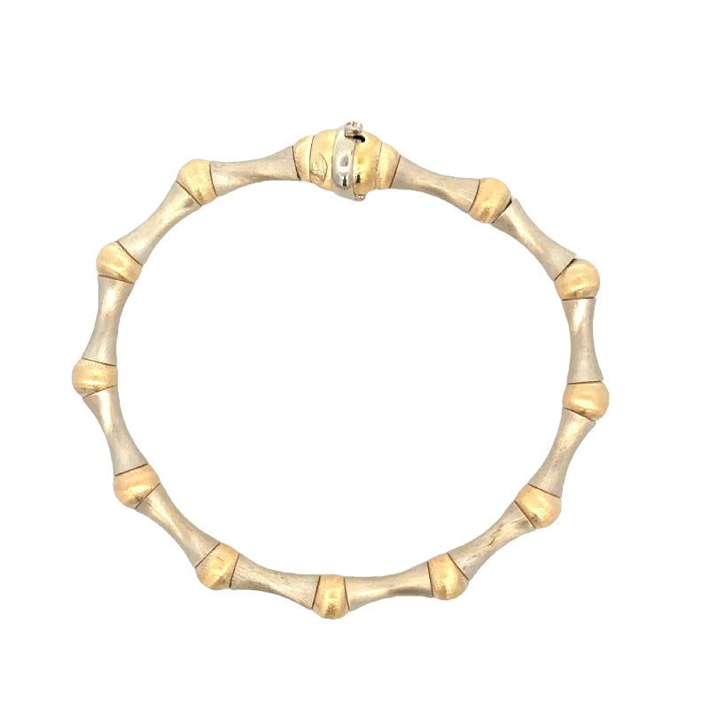 Marquise - cut diamond engagement ring with a split - shank band in platinumTwo Tone Spiral Bracelet in Brushed 14k Gold Marquise - cut diamond engagement ring with a split - shank band in platinumTwo Tone Spiral Bracelet in Brushed 14k Gold