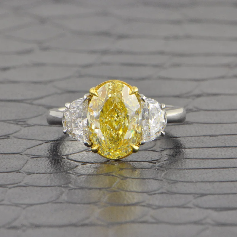 Asscher - cut diamond engagement ring with a pavé - set eternity band in platinumFancy Light Yellow Oval Cut Diamond Ring in Platinum Asscher - cut diamond engagement ring with a pavé - set eternity band in platinumFancy Light Yellow Oval Cut Diamond Ring in Platinum