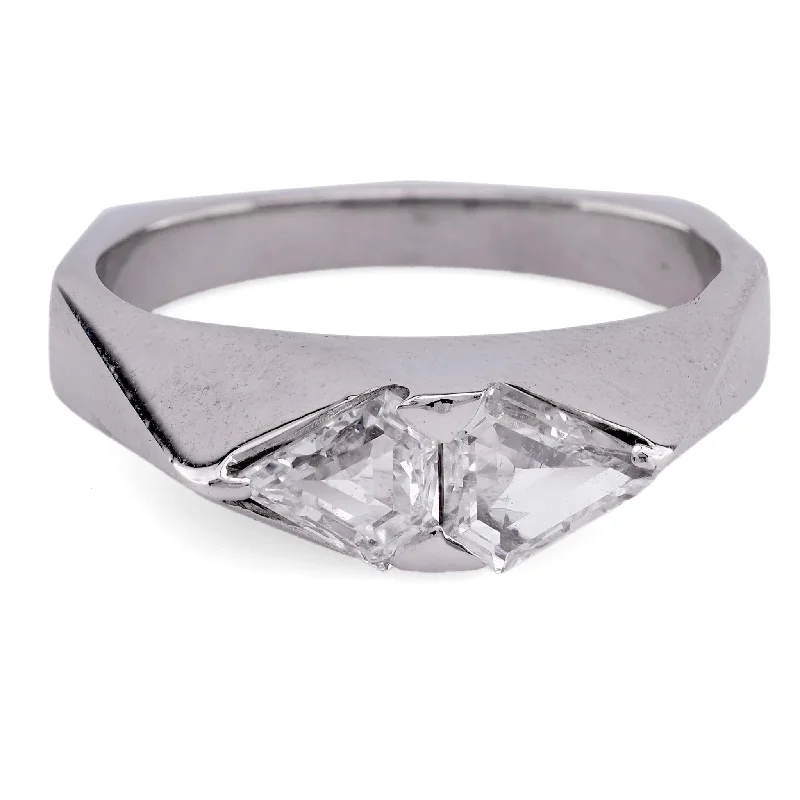 Halo diamond engagement ring in 18K white gold with a center oval - cut stoneFrench Diamond Platinum and White Gold Geometric Ring Halo diamond engagement ring in 18K white gold with a center oval - cut stoneFrench Diamond Platinum and White Gold Geometric Ring