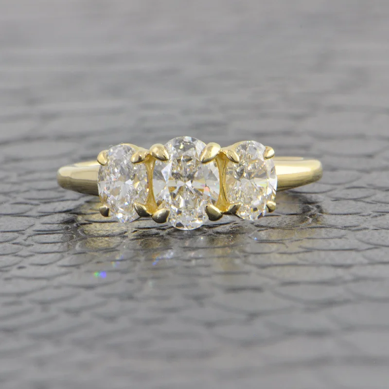 Round - cut diamond engagement ring with a twisted band design in 14K white goldThree Stone 1.62 CTW Oval Cut Diamond Engagement Ring Round - cut diamond engagement ring with a twisted band design in 14K white goldThree Stone 1.62 CTW Oval Cut Diamond Engagement Ring
