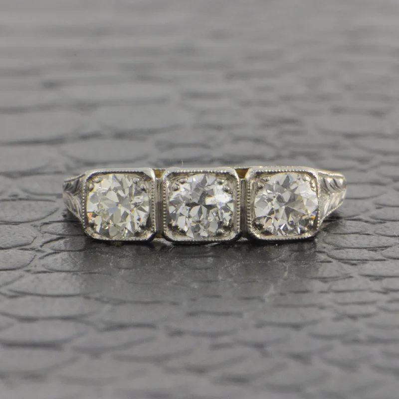 Aquamarine and diamond engagement ring in a 18K white - gold setting with a scalloped edgeAntique Edwardian Yellow Gold and Platinum Old European Cut Diamond Ring
