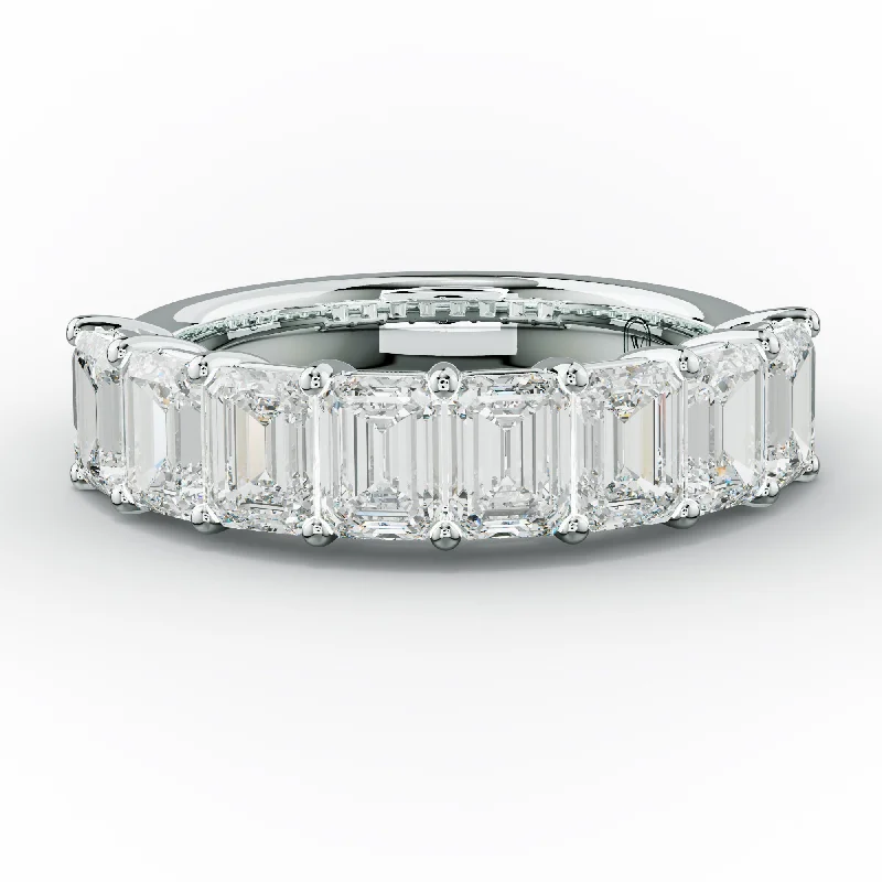 Yellow gold anniversary rings with a warm luster3.0 Carat Emerald Cut Diamond Anniversary Band Yellow gold anniversary rings with a warm luster3.0 Carat Emerald Cut Diamond Anniversary Band