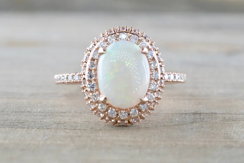Men's emerald - encrusted rings for a rich green tonePenelope Oval Opal Diamond Halo Ring Men's emerald - encrusted rings for a rich green tonePenelope Oval Opal Diamond Halo Ring