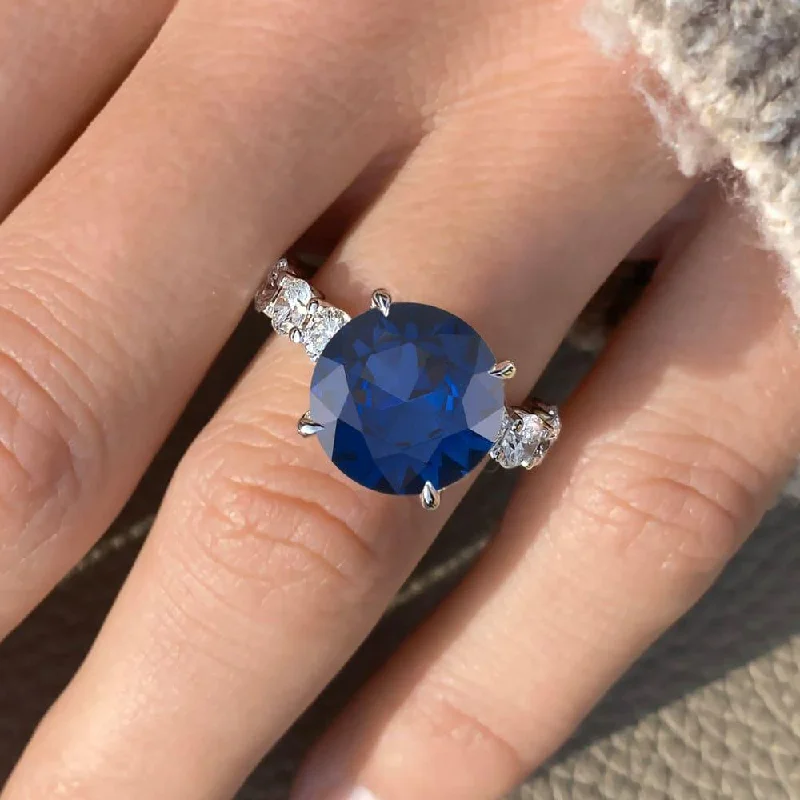 Men's Tanzanite Engagement Rings in Palladium with a Three - Stone Arrangement10 Carat Round Shape Floating Prong Blue Sapphire Engagement Ring Men's Tanzanite Engagement Rings in Palladium with a Three - Stone Arrangement10 Carat Round Shape Floating Prong Blue Sapphire Engagement Ring