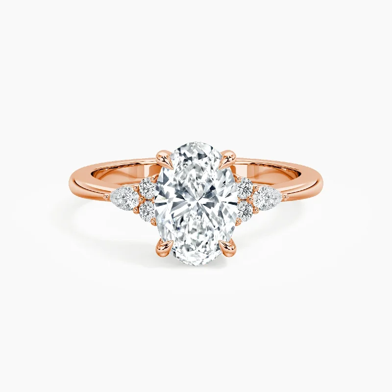 Women's Diamond Rings with Sapphire Accents in Blue for a Colorful and Sophisticated TouchAuriya 14kt Rose Gold Lab Grown Oval Diamond Engagement Ring with Dainty Tapered Diamond Embrace (F-G, VS)