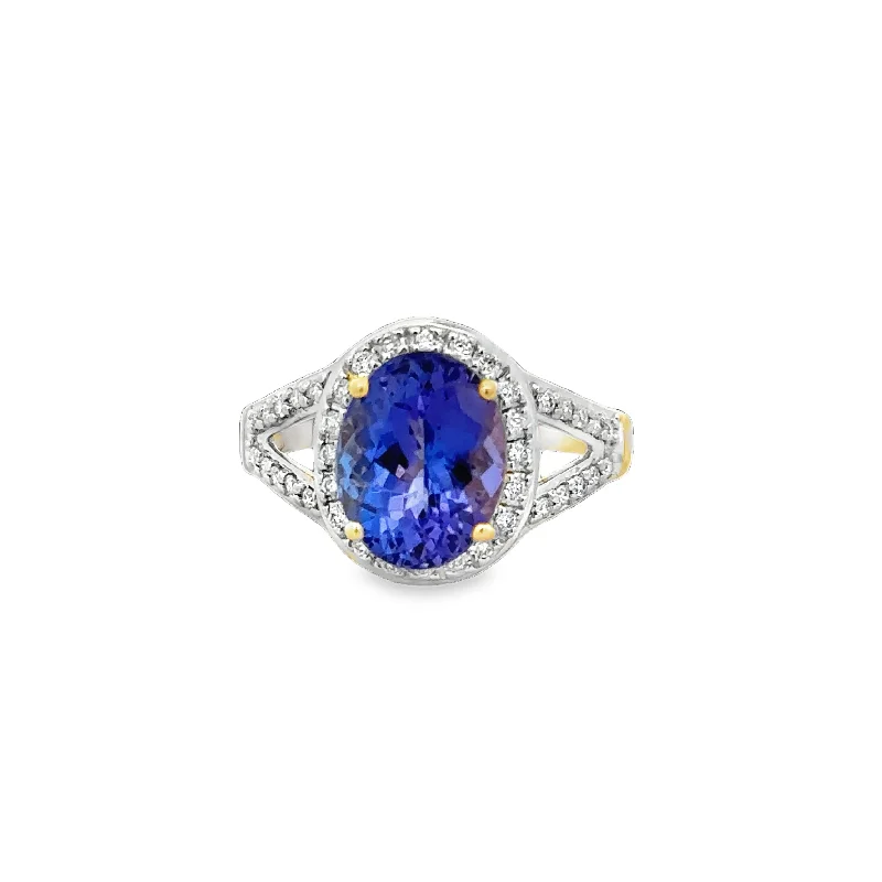 Pink diamond engagement ring in a rose - gold band with white - gold accentsTanzanite and Diamond Ring in Yellow Gold Pink diamond engagement ring in a rose - gold band with white - gold accentsTanzanite and Diamond Ring in Yellow Gold