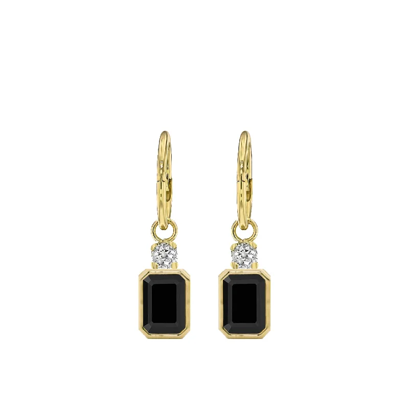 Pear - shaped diamond engagement ring with side baguette diamonds in 18K goldYellow Gold Bezel Spinel and Diamond Sleeper Earrings Pear - shaped diamond engagement ring with side baguette diamonds in 18K goldYellow Gold Bezel Spinel and Diamond Sleeper Earrings