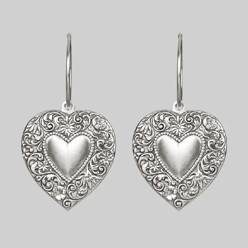 Chunky hoop earringsLOVE STRUCK. Heart Hoop Earrings - Silver