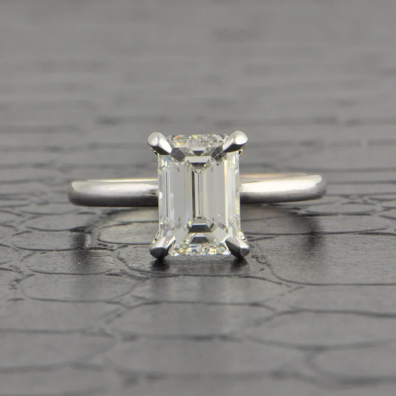Three - stone diamond engagement ring in rose gold, symbolizing past, present, and futureGIA 2.08 ct. G-VS1 Emerald Cut Diamond Engagement Ring Three - stone diamond engagement ring in rose gold, symbolizing past, present, and futureGIA 2.08 ct. G-VS1 Emerald Cut Diamond Engagement Ring