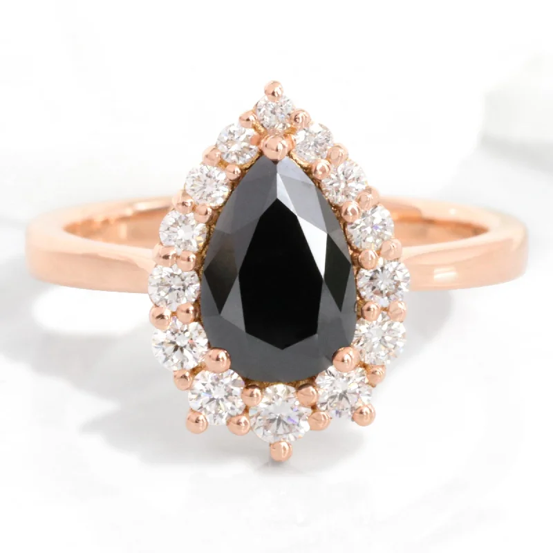 Adjustable Women's Diamond Rings with a Flexible Band for a Comfortable and Custom FitLarge Pear Black Diamond Ring in Tiara Halo Diamond Tapered Band Adjustable Women's Diamond Rings with a Flexible Band for a Comfortable and Custom FitLarge Pear Black Diamond Ring in Tiara Halo Diamond Tapered Band