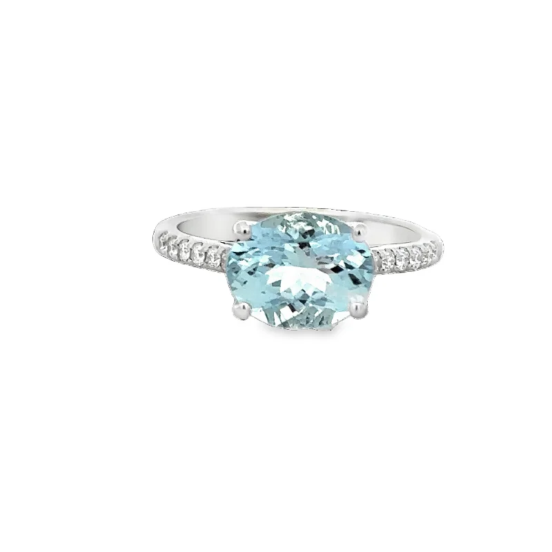 Opal and diamond engagement ring in a contemporary silver band with black - rhodium accentsAquamarine and Diamond Ring in White Gold Opal and diamond engagement ring in a contemporary silver band with black - rhodium accentsAquamarine and Diamond Ring in White Gold