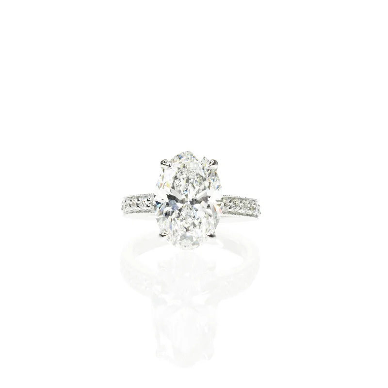 Adjustable Engagement Rings with a Flexible Band and a Princess - Cut Center DiamondStunning Oval Ring with Diamonds on Shoulder Adjustable Engagement Rings with a Flexible Band and a Princess - Cut Center DiamondStunning Oval Ring with Diamonds on Shoulder