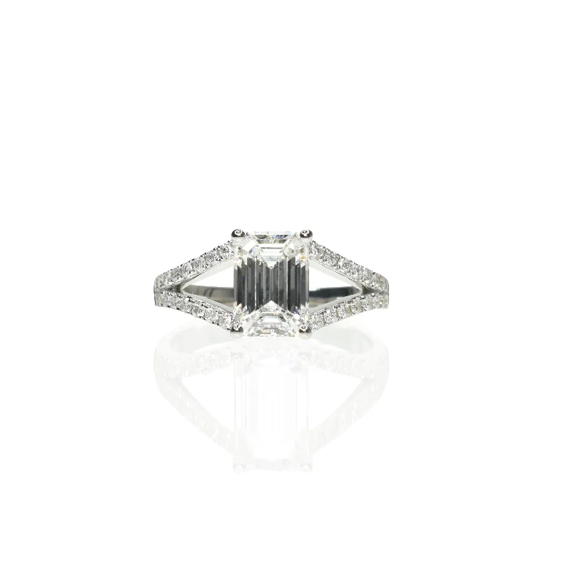 Cathedral - Style Engagement Rings with a Raised Center Stone and Intricate MetalworkSplit Shank Engagement Ring with Emerald Shaped Diamond Cathedral - Style Engagement Rings with a Raised Center Stone and Intricate MetalworkSplit Shank Engagement Ring with Emerald Shaped Diamond