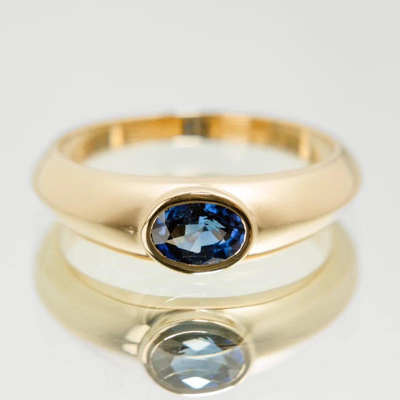 Cathedral - Style Engagement Rings with a Raised Center Stone and Intricate MetalworkRoyal Blue Sapphire Signet Ring in 14k Yellow Gold Cathedral - Style Engagement Rings with a Raised Center Stone and Intricate MetalworkRoyal Blue Sapphire Signet Ring in 14k Yellow Gold