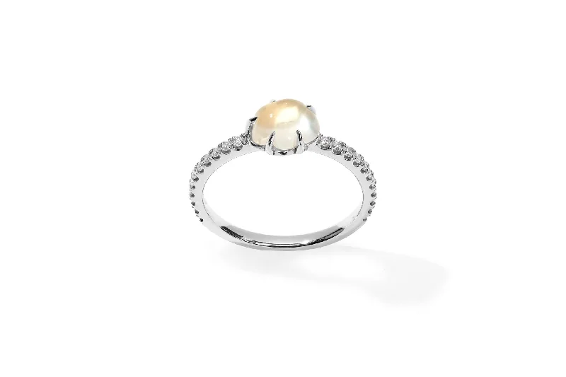 Opal Gemstone Rings in Rose Gold with a Milgrain Edge for a Feminine and Romantic StyleMid Cloud Pavé 18K Whitegold Ring w. Milky Quartz & Diamonds Opal Gemstone Rings in Rose Gold with a Milgrain Edge for a Feminine and Romantic StyleMid Cloud Pavé 18K Whitegold Ring w. Milky Quartz & Diamonds